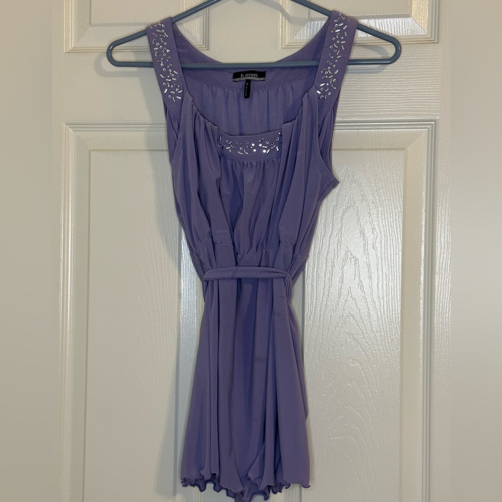B. Street sleeveless blouse with embellishments
